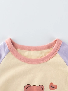 Kids long sleeve T-shirt featuring a cute bear print and contrast raglan sleeves
