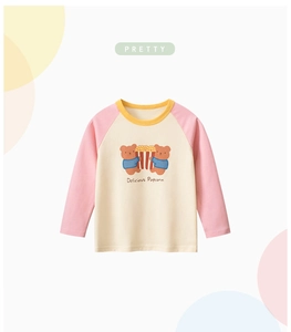 Close-up of raglan sleeves and cute bear popcorn print on cotton long sleeve kids t-shirt