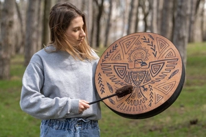Handcrafted Shamanic Siberian Drum with ethnic eagle pattern and wooden mallet detail