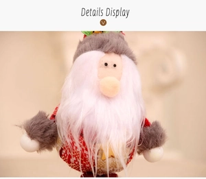 Close-up of Santa Claus plush ornament with red plaid fabric and white faux fur detail