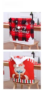 Detailed view of red and buffalo plaid Christmas chair back covers with festive patterns