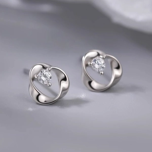 Mobius ring earrings in silver finish with a sparkling round zircon centerpiece