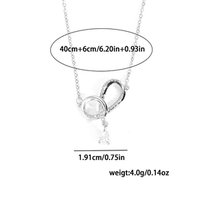 Detailed view of silver necklace pendant with zirconia stones and measurement labels