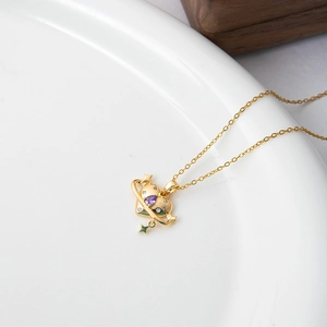 Elegant gold heart planet necklace with purple zircon drop stone and sparkling crystals