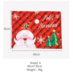 Detail showing 45x35cm Christmas placemat with Santa Claus and Feliz Navidad print