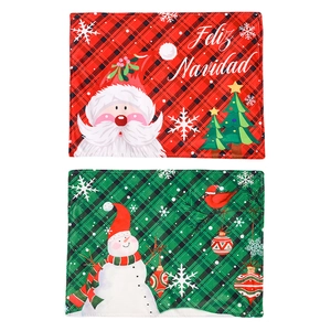 Set of 2 Christmas plaid placemats featuring Santa Claus, snowmen and festive patterns