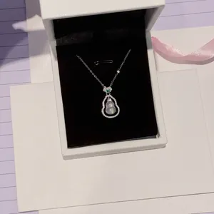 Elegant silver necklace with diamond-encrusted chalcedony gourd pendant in a gift box