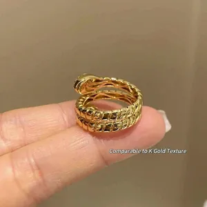 Vintage 925 sterling silver snake ring with gold plating and cubic zirconia scales