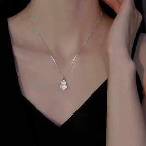 Detail of S925 silver gourd pendant necklace with white chalcedony and pave stones