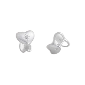 Silver heart hoop earrings with starburst zircon inlay shown in a frontal and side view