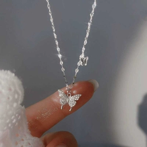 Elegant silver butterfly pendant necklace with sparkling micro-pave zircon crystals