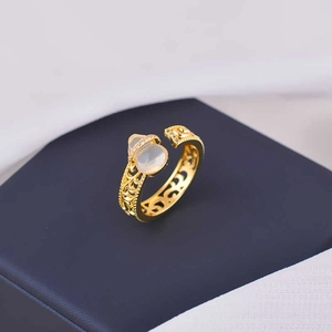 Elegant gold-plated gourd ring with white zircon and hollow lace pattern details