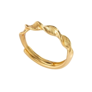 Adjustable golden Mobius twist ring featuring brushed texture and mirror polished finish