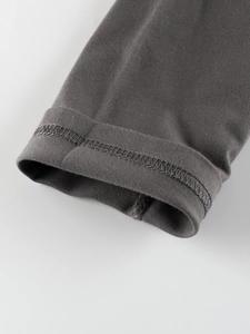 Close-up of gray cotton long-sleeve T-shirt sleeve with detailed double-needle stitching