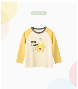 Detail of kids long sleeve raglan T-shirt with cute yellow bear print and gray crew neck