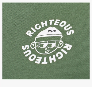 Detail of cartoon character print and Righteous text on green fleece sweatshirt