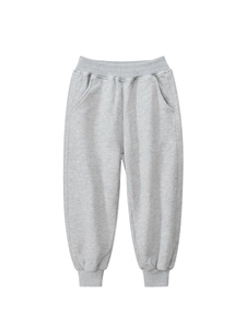 Kids loose fit light grey jogger pants with elastic drawstring waist and ribbed cuffs