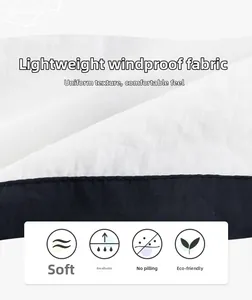 Detail of lightweight windproof fabric showing soft texture and blue-white stitching