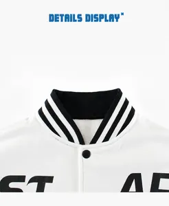 Close-up of black and white striped ribbed collar and snap buttons on fleece jacket