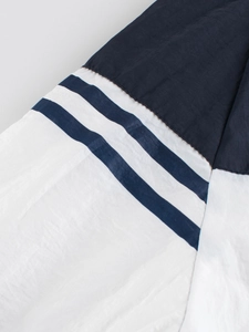 Navy and white colorblock kids hooded windbreaker with striped sleeves and zip closure