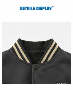 Close-up of kids baseball jacket featuring ribbed striped collar and thick fleece lining