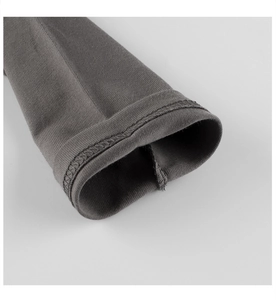 Detail of dark grey long sleeve t-shirt cuff with double-needle stitching and knit fabric