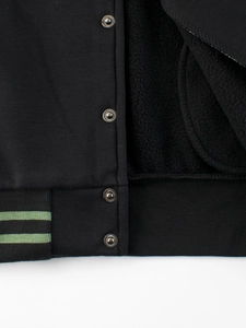 Kids black fleece baseball jacket with warm lining and striped ribbed hem details