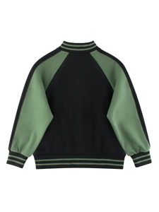 Back view of kids varsity jacket in black and sage green with striped rib knit trims