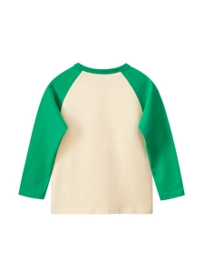 Kids long sleeve raglan T-shirt with green sleeves and cream body on a white background