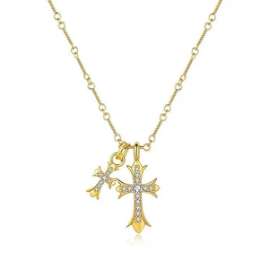 Detail of gold cross pendants with pavé set white crystals on a classic link chain necklace