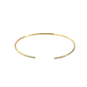 Elegant gold-plated open cuff bracelet with sparkling zircon stones in a minimalist design