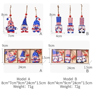 Macro view of Independence Day wooden gnome hanging ornaments with red beads and ropes