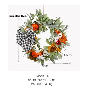 Detailed view of autumn wreath with pumpkins, pine cones, and dimensions 45x30x10cm