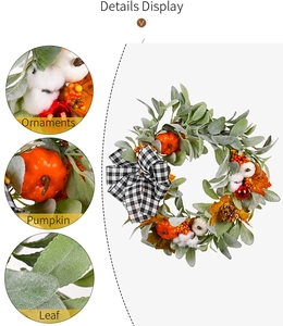 Detail shots of autumn wreath with cotton, mini pumpkins, and black white plaid bow