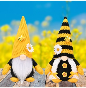 Detailed knit gnome set with bee appliques and daisies for seasonal home decoration