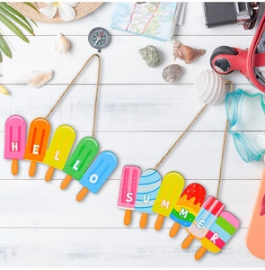 Detail of colorful wooden ice pop summer wall decor with HELLO SUMMER lettering