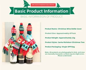 Detailed view of knitted Christmas wine bottle covers with Santa and reindeer motifs