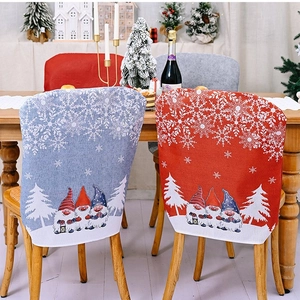 Christmas chair covers featuring cartoon gnomes and snowflakes in red and blue colors