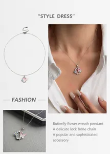 Détail du collier couronne papillon en émail avec diamants étincelants et chaîne en argent