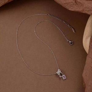 Silver fringe sugar cube necklace with pink zircon pendant and micro-pave crystals