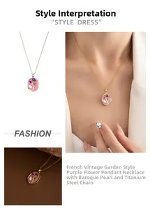 Detail view of French retro oval pendant with purple floral motif and Baroque pearl accent