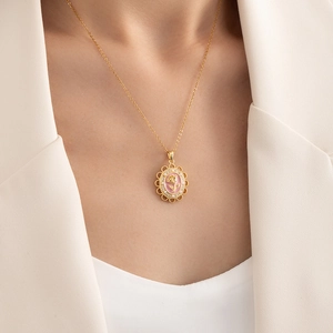 French retro rose pendant necklace with pink enamel and gold titanium steel chain on model