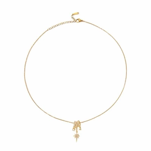 Detailed view of gold starburst necklace with cubic zirconia paving and adjustable chain
