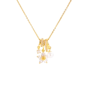 Gold titanium steel necklace with crystal flower and white pearl pendant on white background