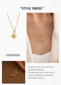 Detail of gold necklace with star, moon and sun charms featuring micro-set cubic zirconia