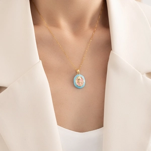 Elegant gold tulip necklace with blue and pink enamel flower pendant on model