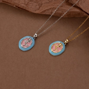 Vintage tulip necklaces in gold and silver finish with blue enamel rose pendant