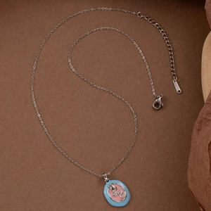 Retro tulip pendant necklace with light blue and pink enamel on a silver steel chain