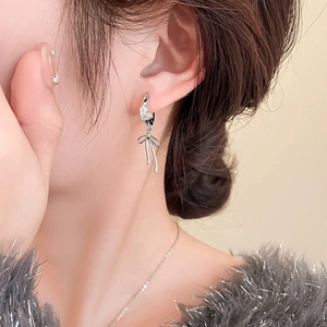 Elegant silver heart earrings with ribbon bow charms and cubic zirconia stones