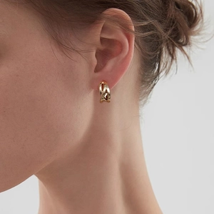French style double-layer C-shape gold hoop earrings shown on a model for women